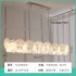 French style living room pendant light, modern, luxurious, high-end, elongated dining room lighting fixture, 2025 new cream style master bedroom light