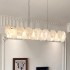French style living room pendant light, modern, luxurious, high-end, elongated dining room lighting fixture, 2025 new cream style master bedroom light
